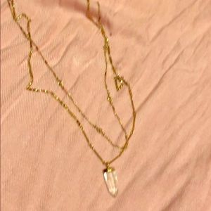 Gold double strand necklace with clear pendant